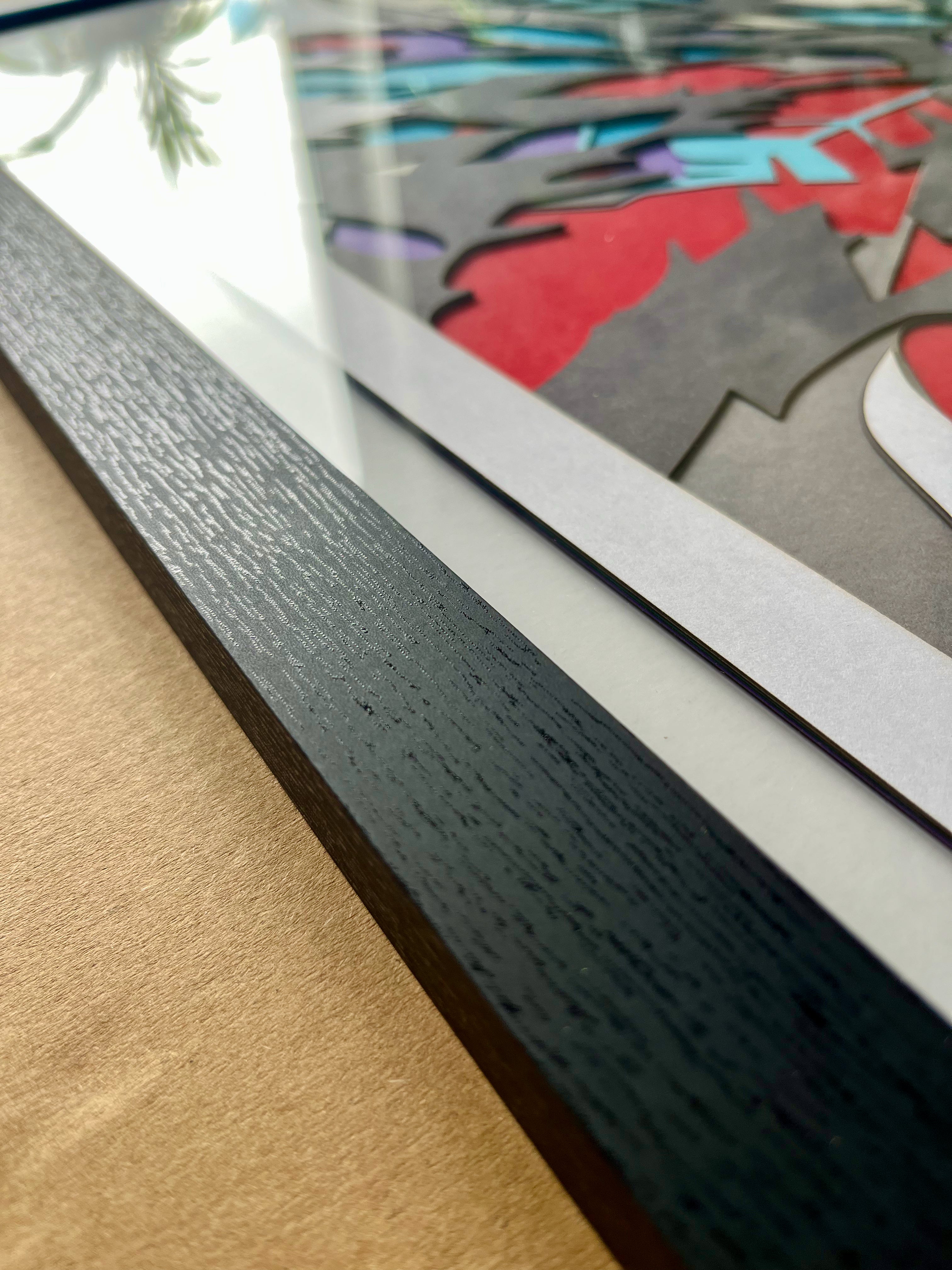 Crâne avec plumes indiennes encadré 70x70cm