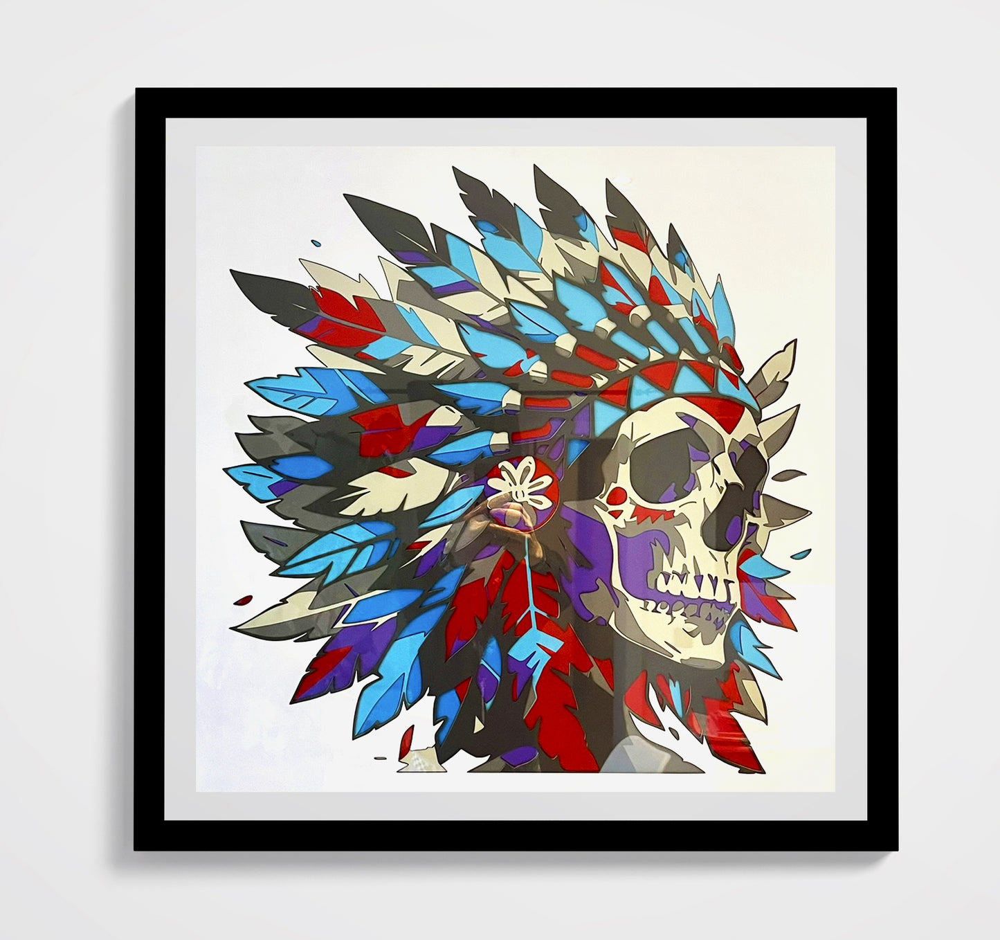 Crâne avec plumes indiennes encadré 70x70cm